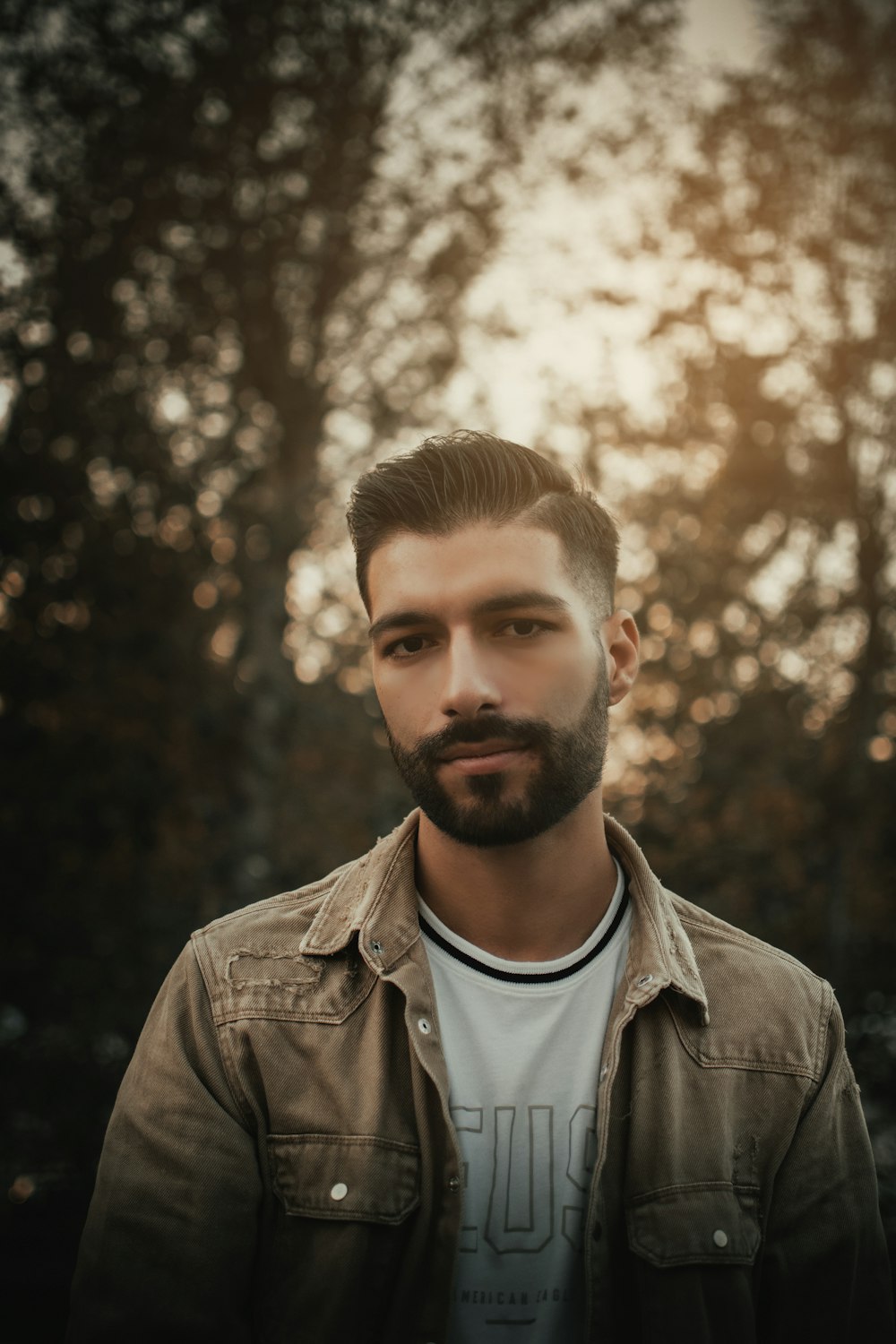 man in grey leather jacket