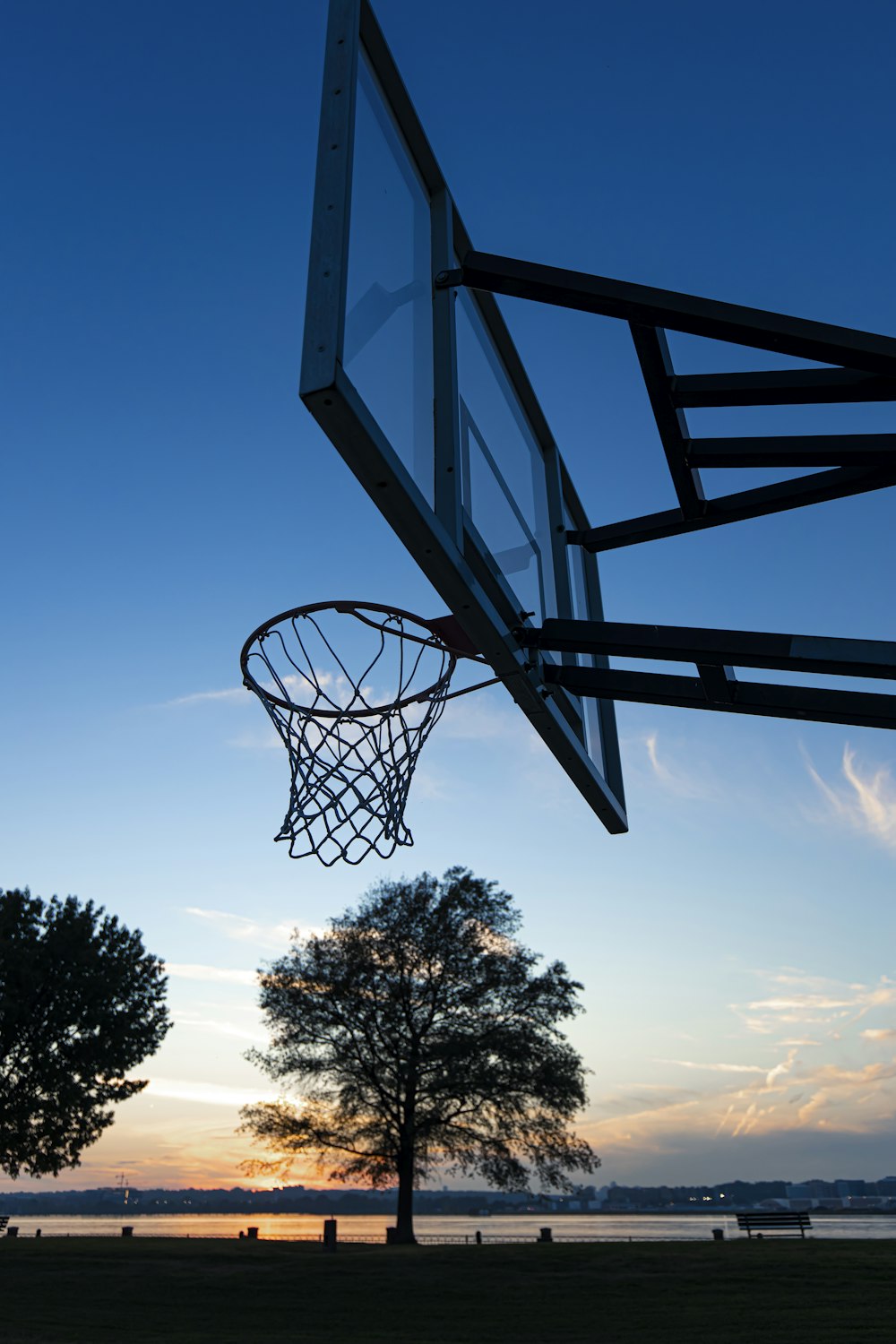 basketball hoop under blue sky during daytime