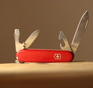 red and silver multi tool