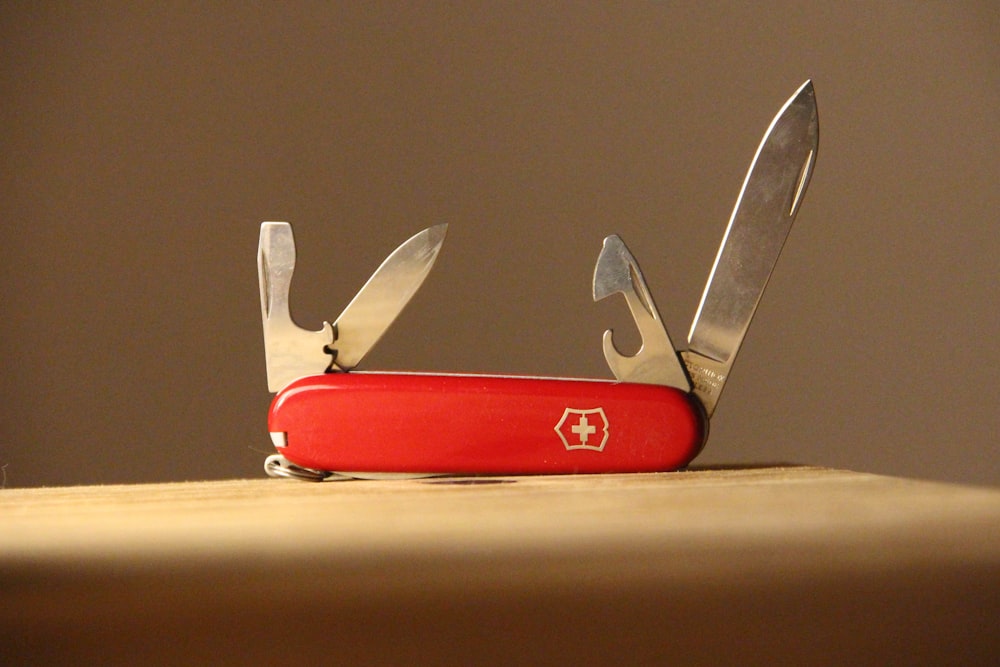 red and silver multi tool
