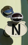 silver and black round accessory