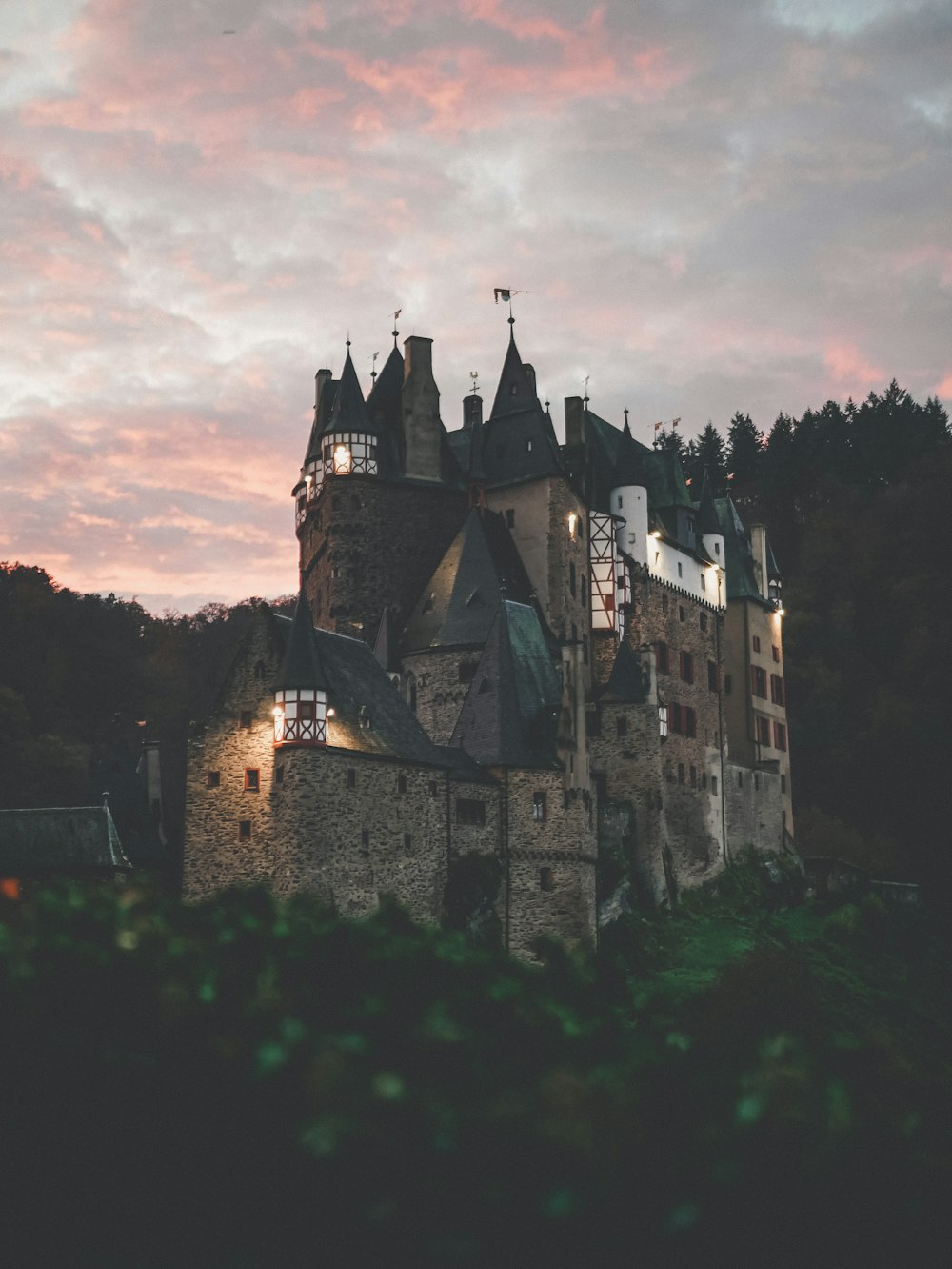 gray concrete castle under cloudy sky during daytime