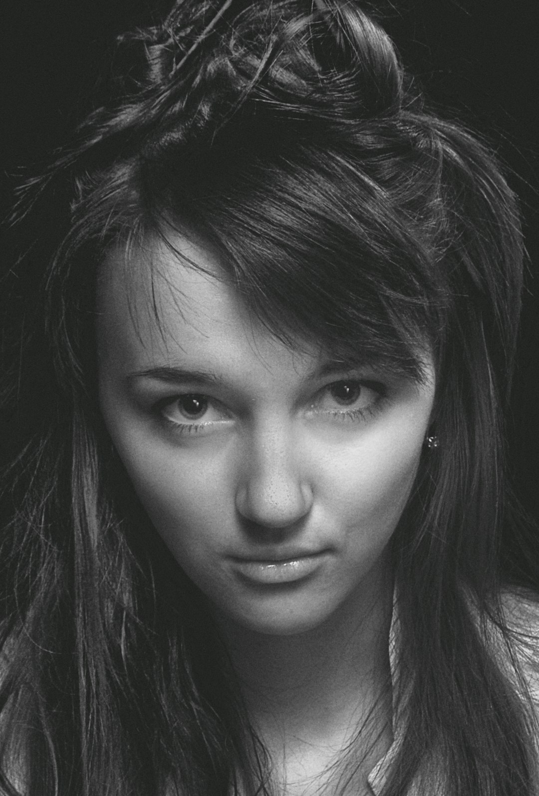 grayscale photo of womans face