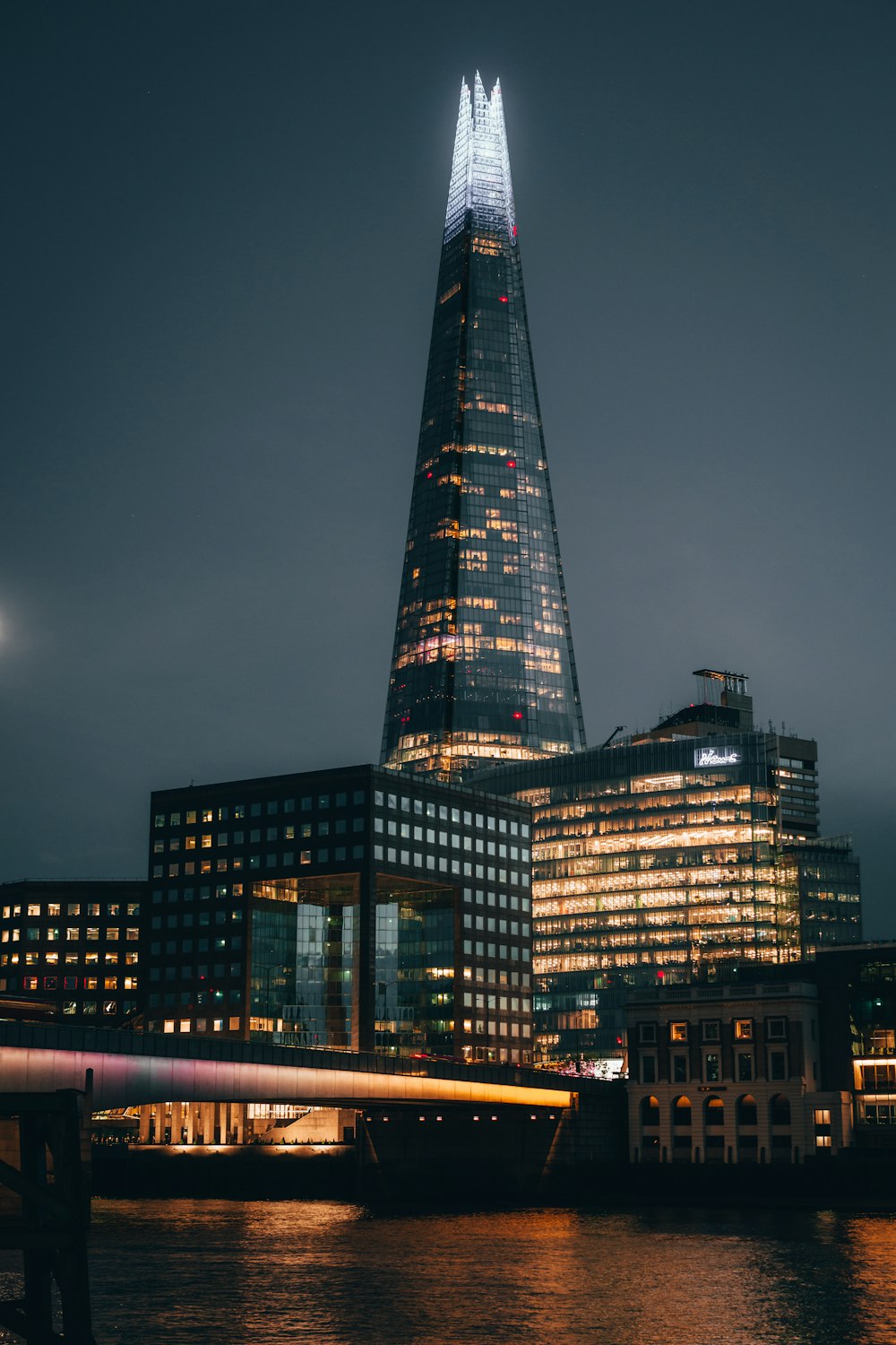 black and brown concrete building during night time