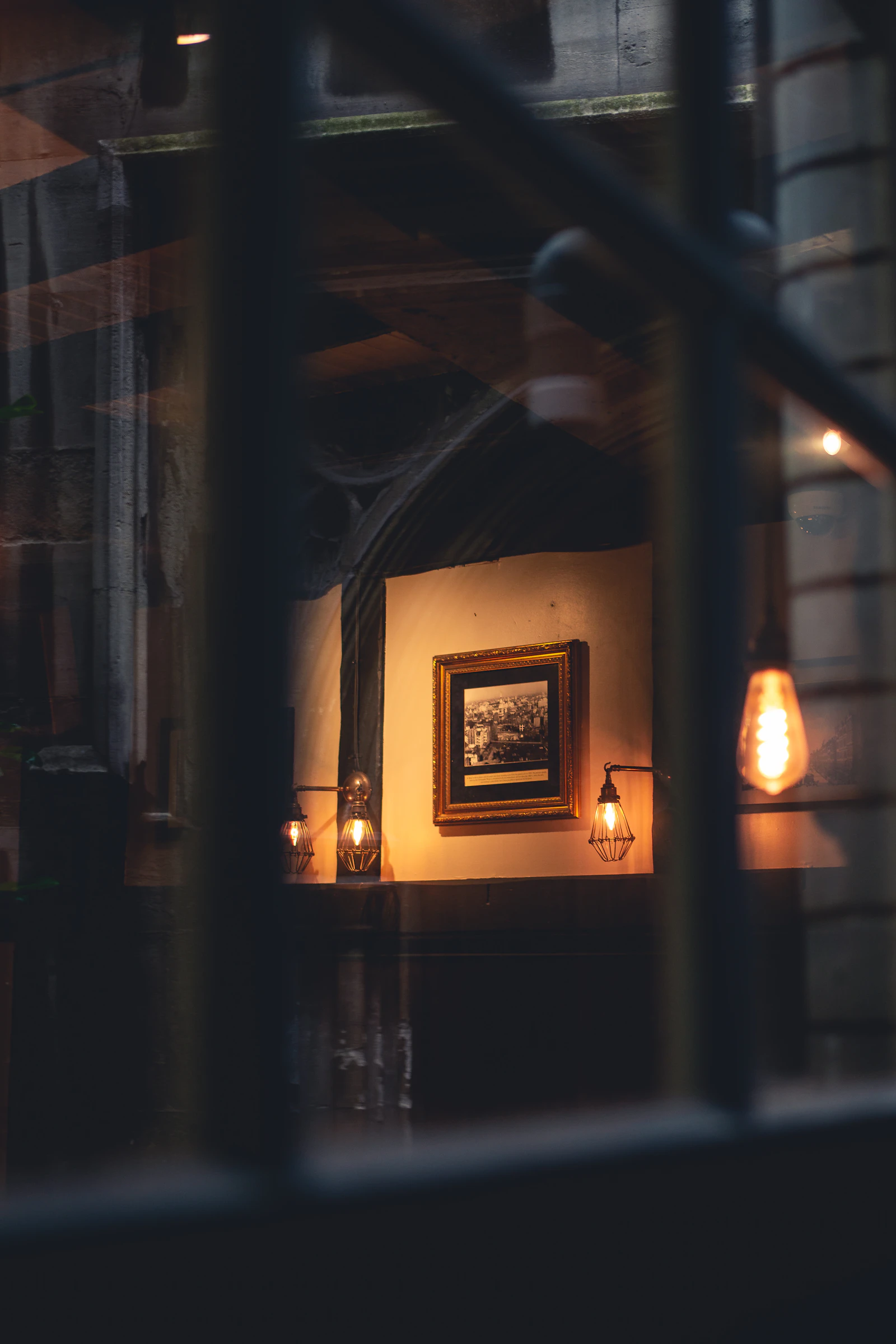 A candlelit historic room set as though recently occupied