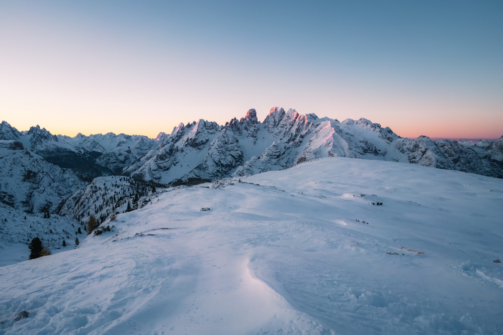 snow covered mountain under blue sky during daytime