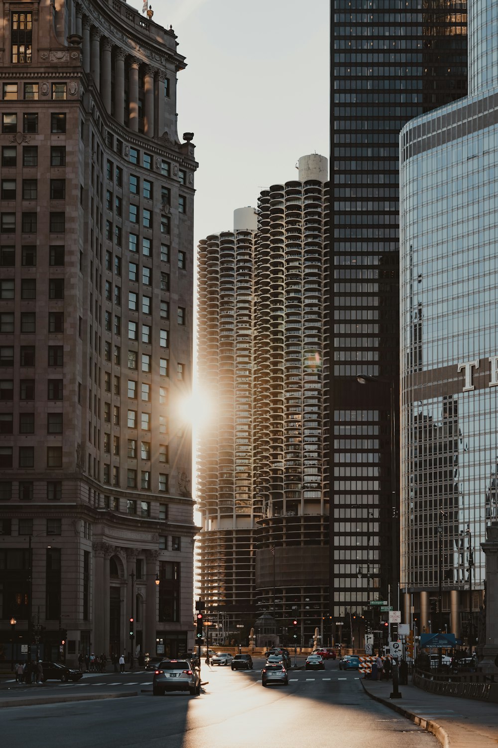 city buildings with lights turned on during night time