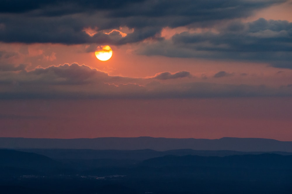 silhouette of mountains during sunset