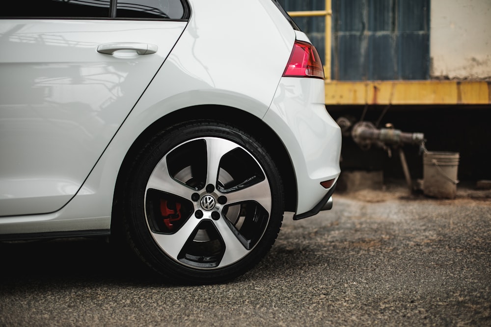 white car on brown soil