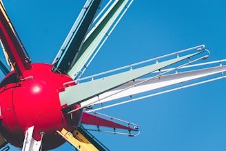 Close-up of a colorful kiddie ride in operation.