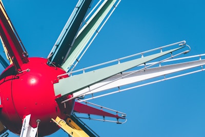 Close-up of a colorful kiddie ride in operation.
