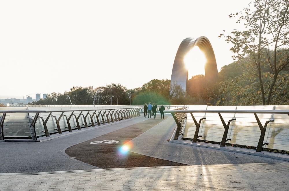 gray concrete bridge over river during daytime