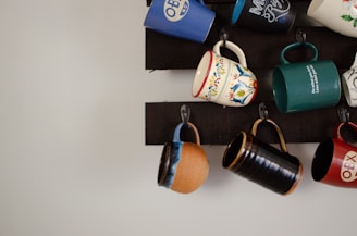 blue and brown ceramic mugs