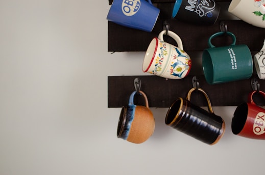 blue and brown ceramic mugs