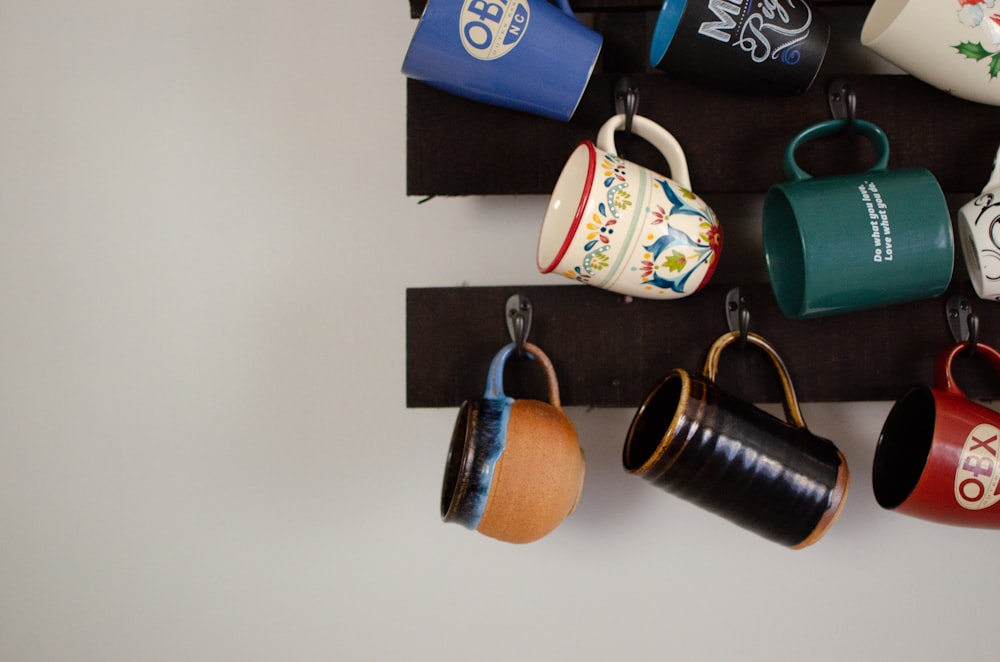 blue and brown ceramic mugs