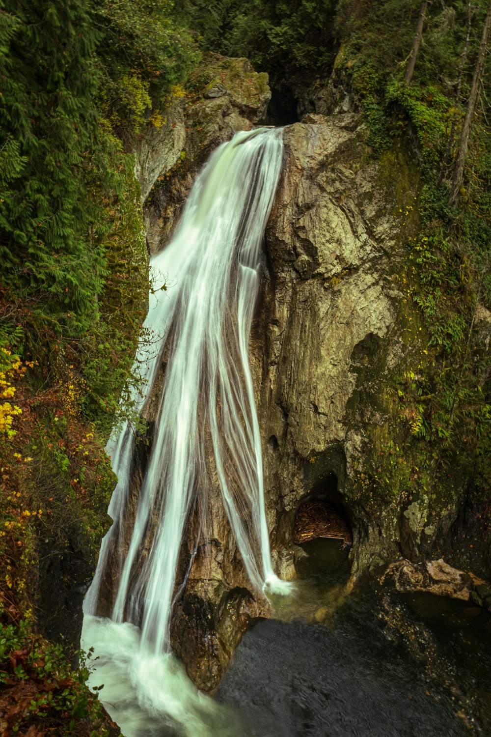 time lapse photography of water falls