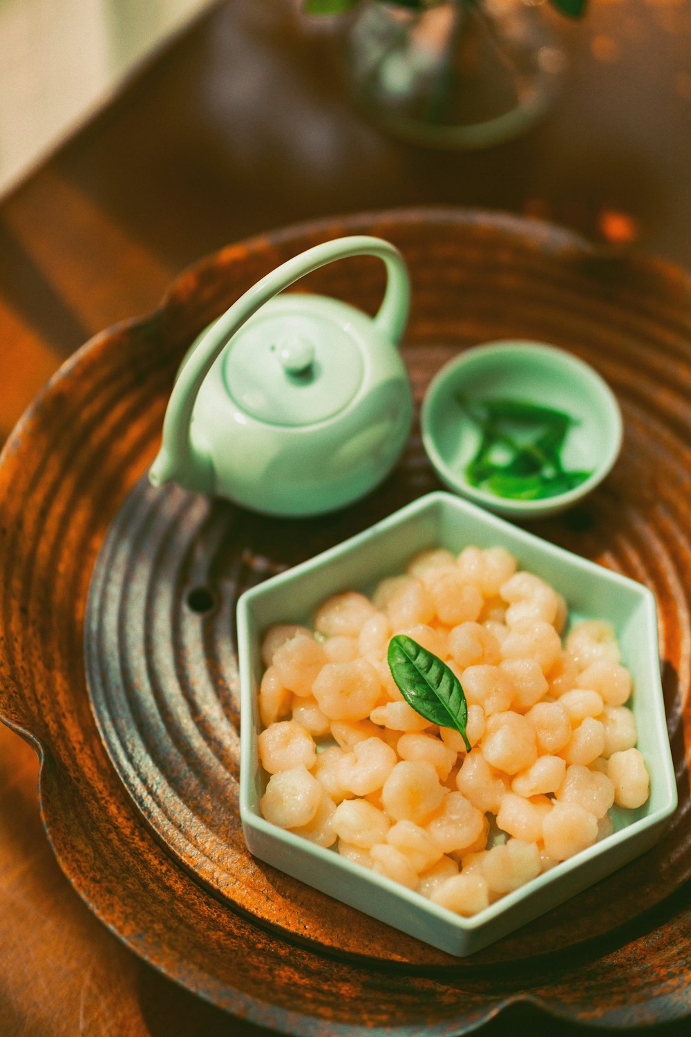 white and brown ceramic bowl with white soup