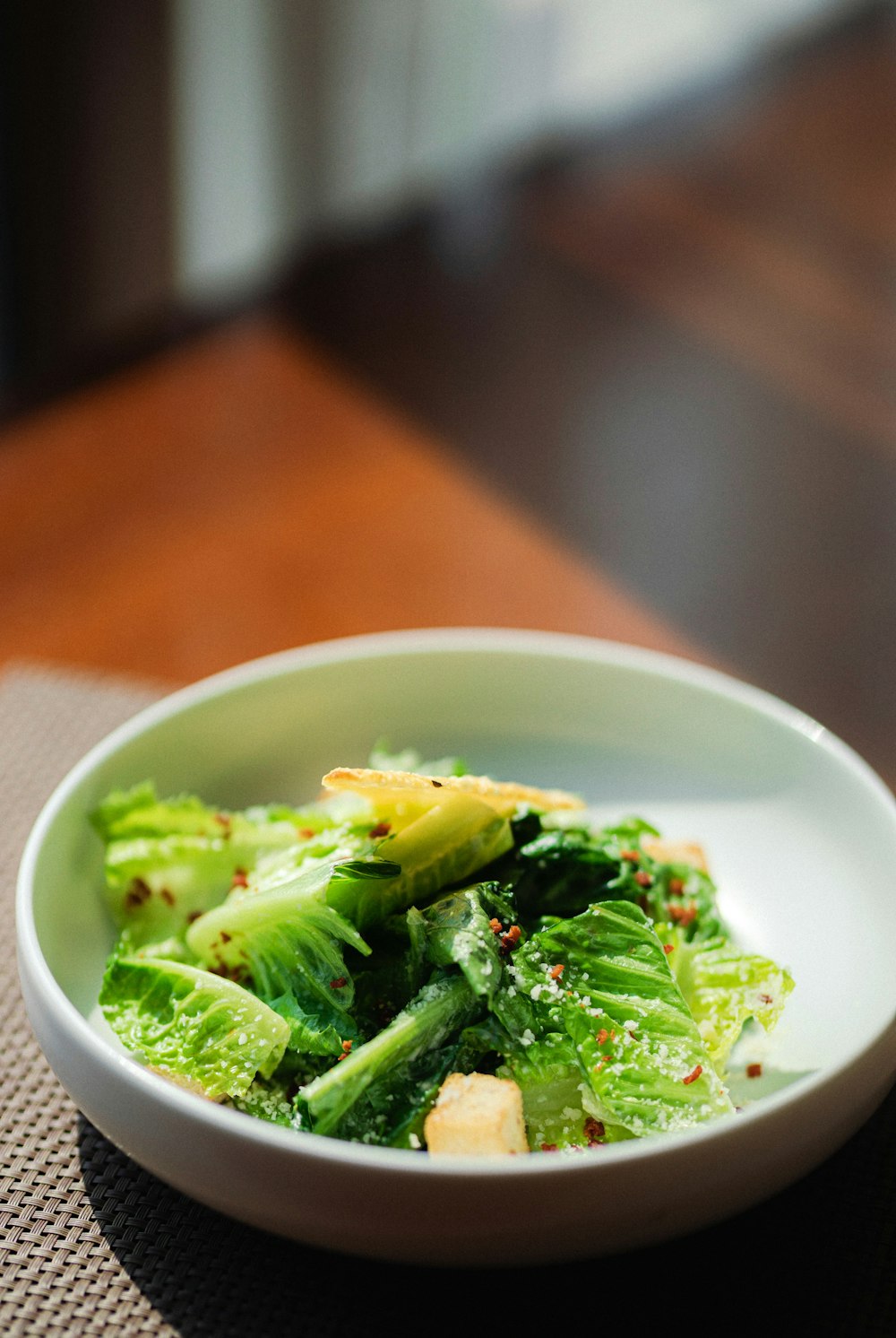 green vegetable on white ceramic bowl