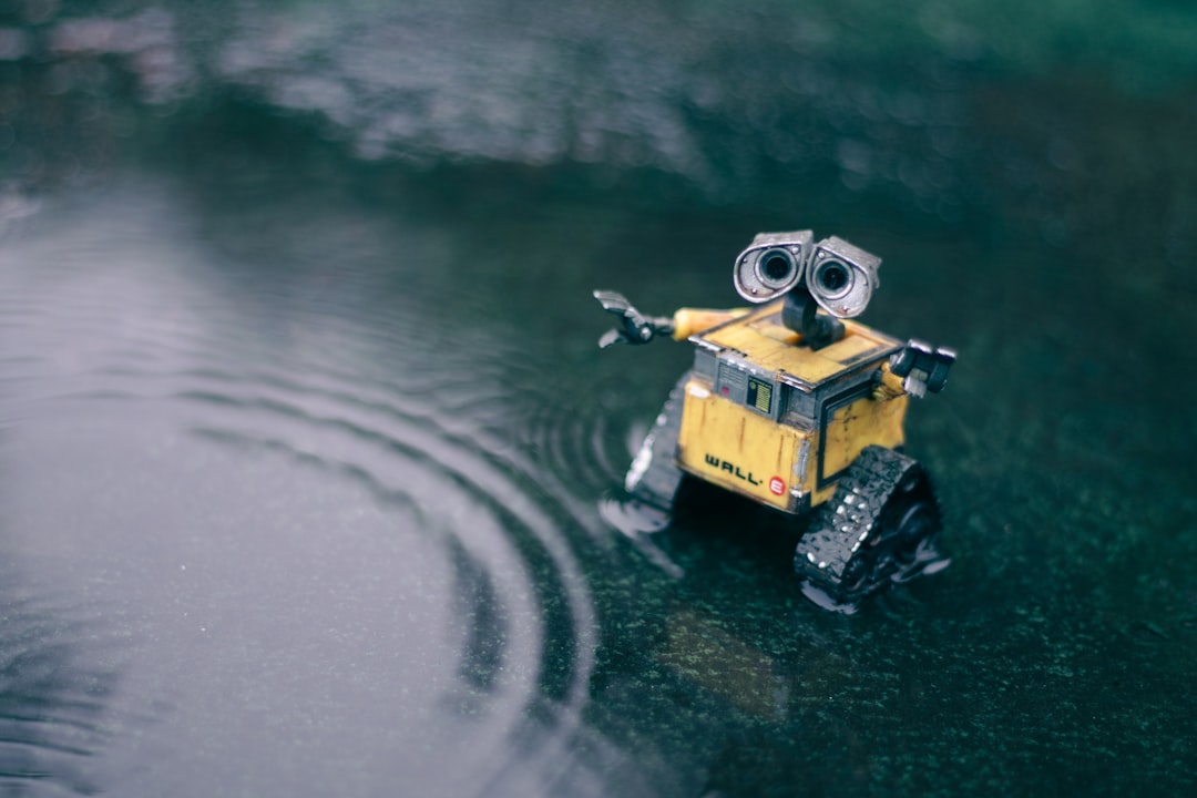 yellow and black robot toy,