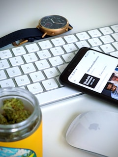 black iphone 7 on white laptop computer