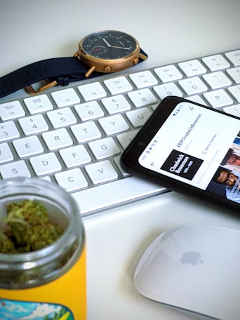 black iphone 7 on white laptop computer