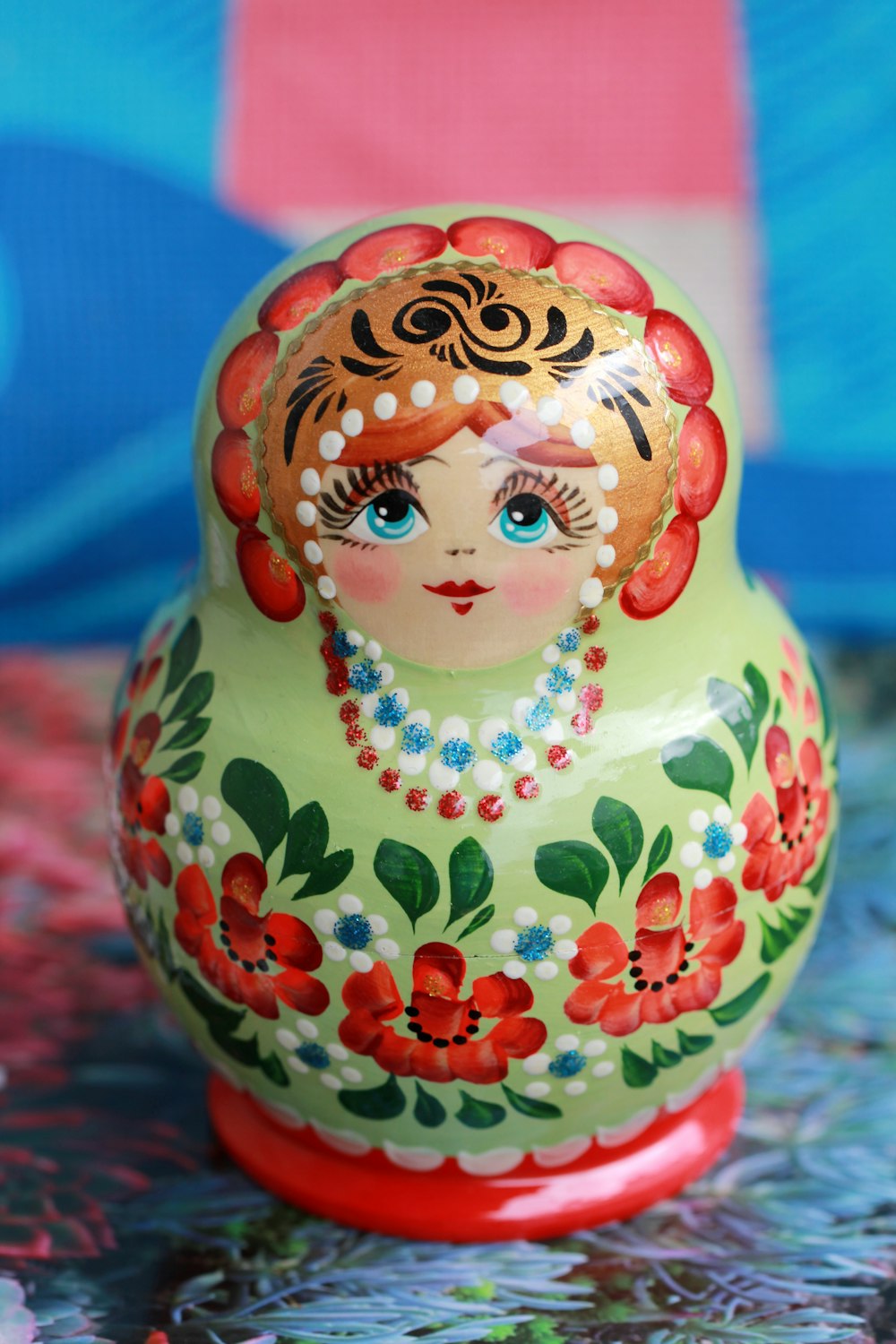 red and white floral ceramic figurine
