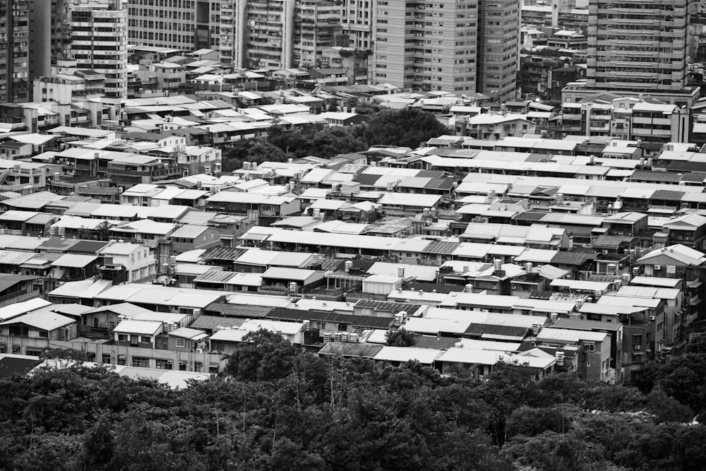 grayscale photo of city buildings