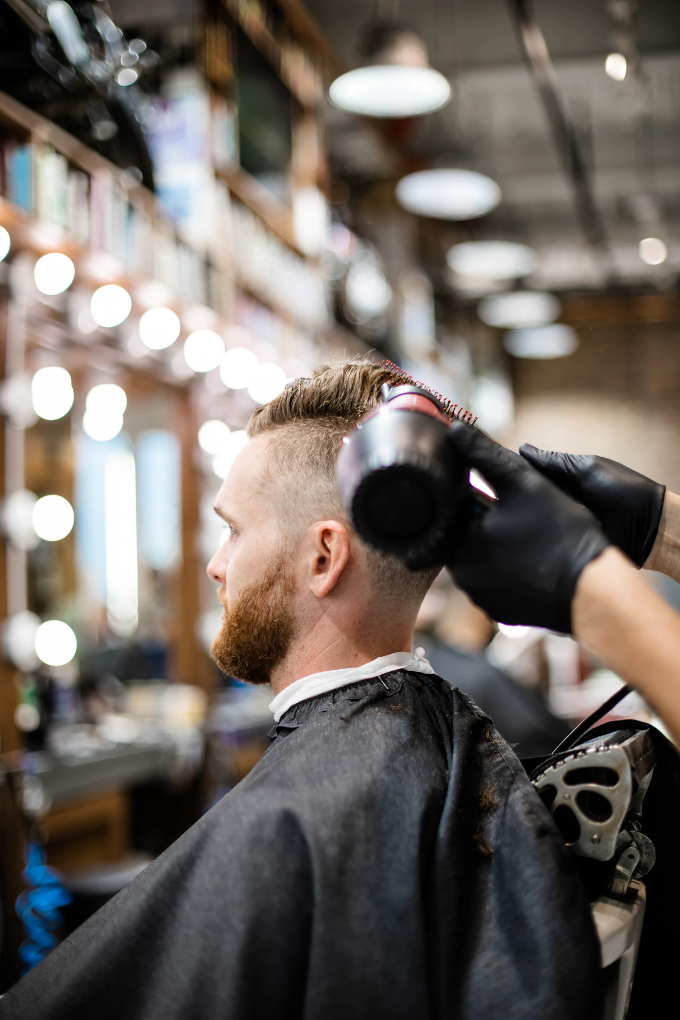 A finish being styled at the chair