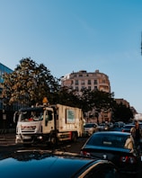 cars parked on street near buildings during daytime