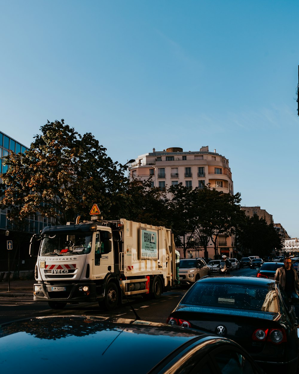 cars parked on street near buildings during daytime