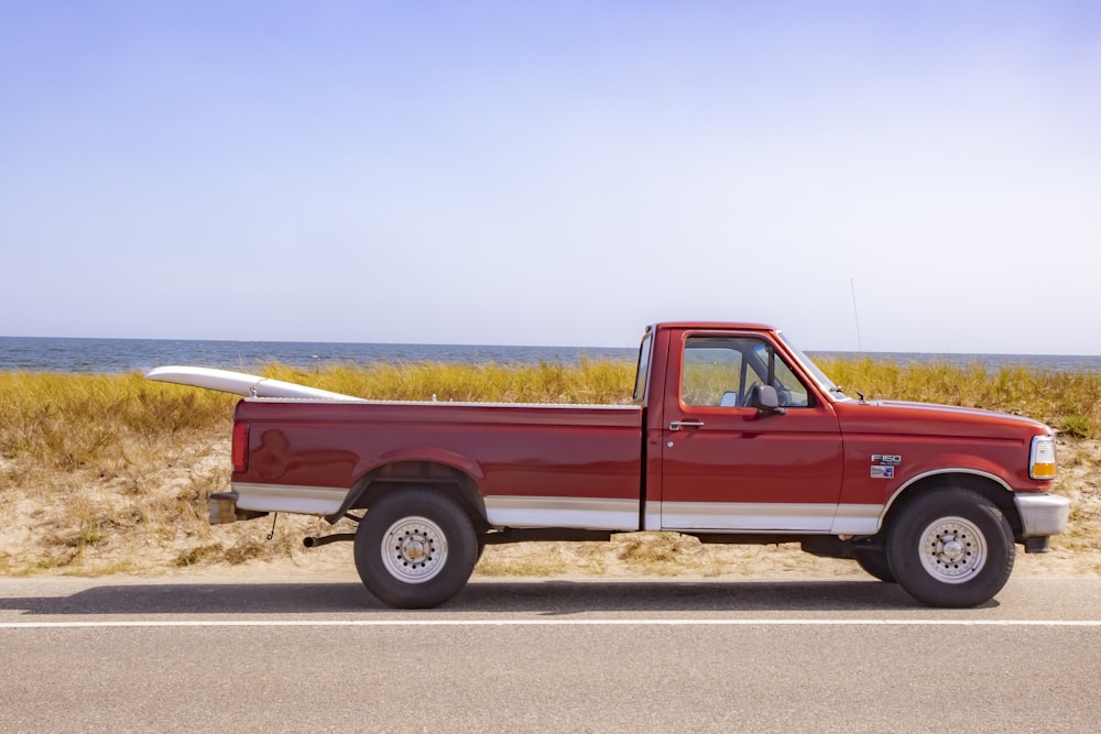 brown crew cab pickup truck on road during daytime