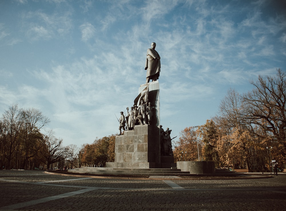 man in black suit statue