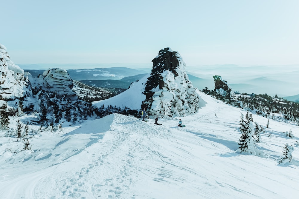 snow covered mountain during daytime