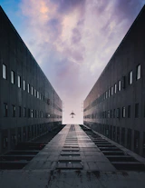 black concrete building under cloudy sky during daytime