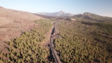 A panoramic view of a newly constructed road cutting through Somaliland’s arid landscape under a clear blue sky.
