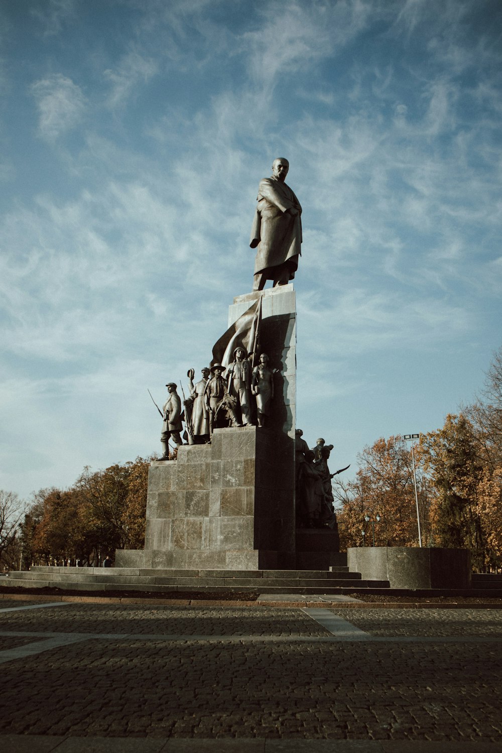 man in black suit statue