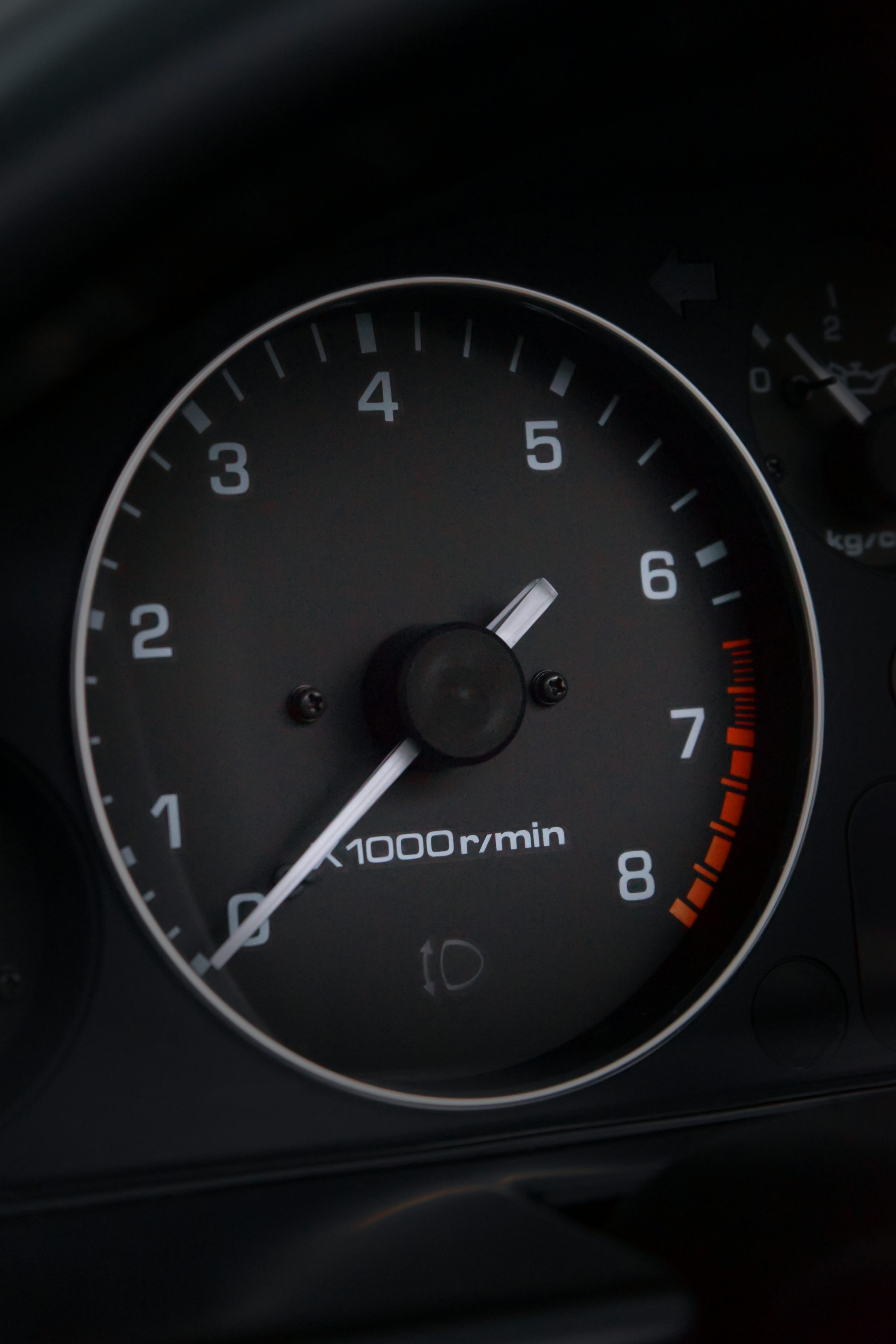 black and white analog speedometer