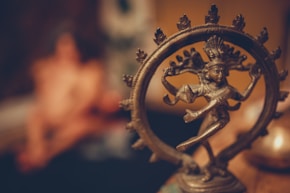 gold steel horse ornament in tilt shift lens