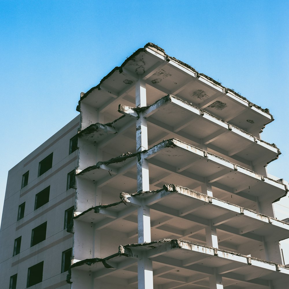 white concrete building under blue sky during daytime