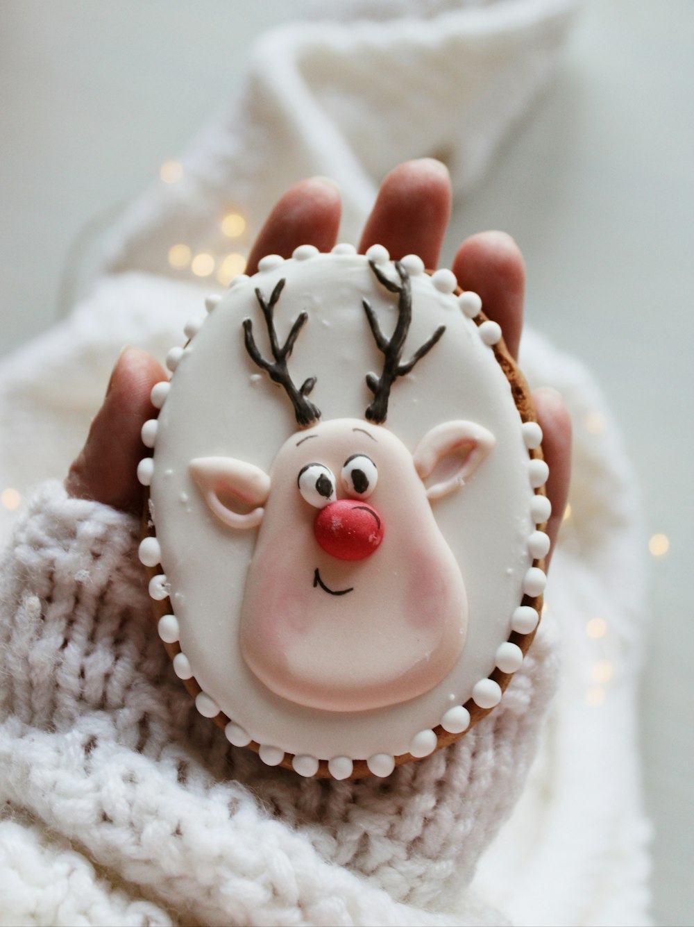 white and red ceramic snowman figurine