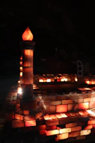An artistic shot of translucent building blocks glowing softly under warm lighting.