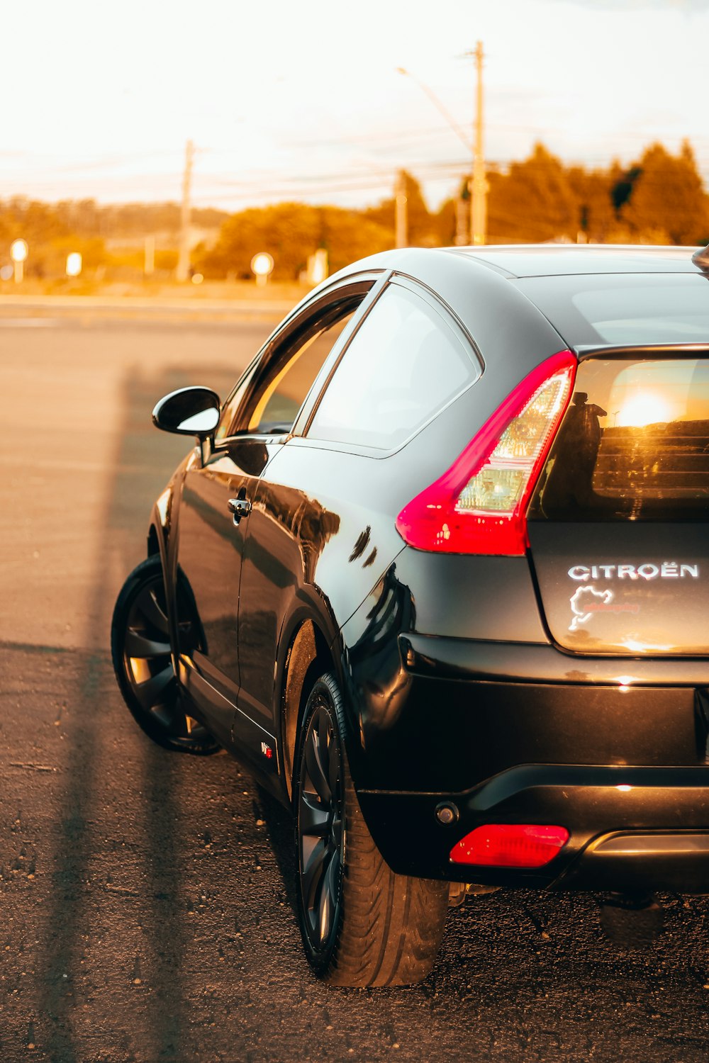 black honda car on road during daytime