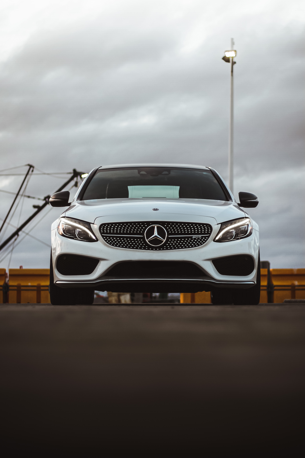 white mercedes benz car on road