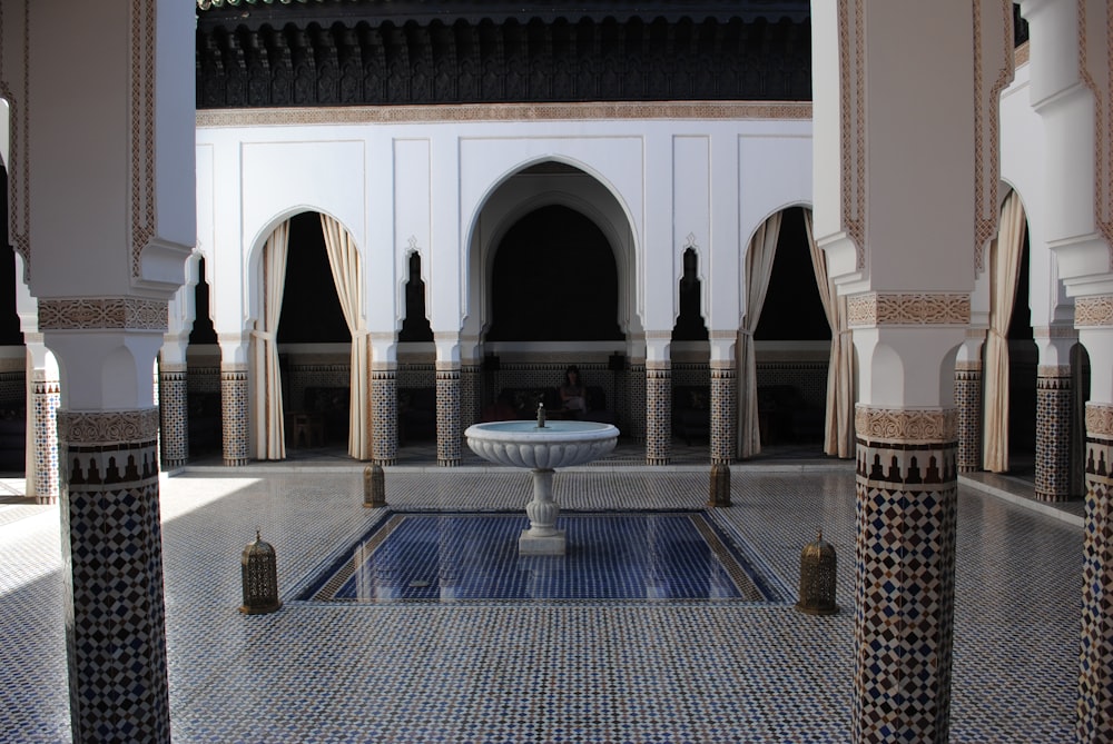 white and blue concrete fountain