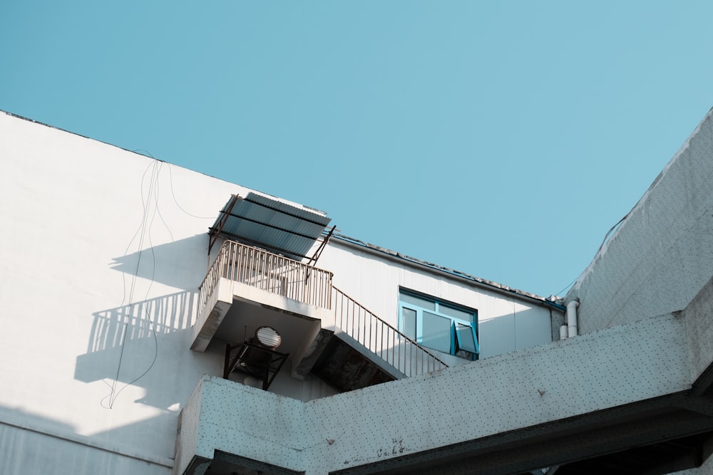 white concrete building under blue sky during daytime