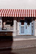 white and red store front during daytime