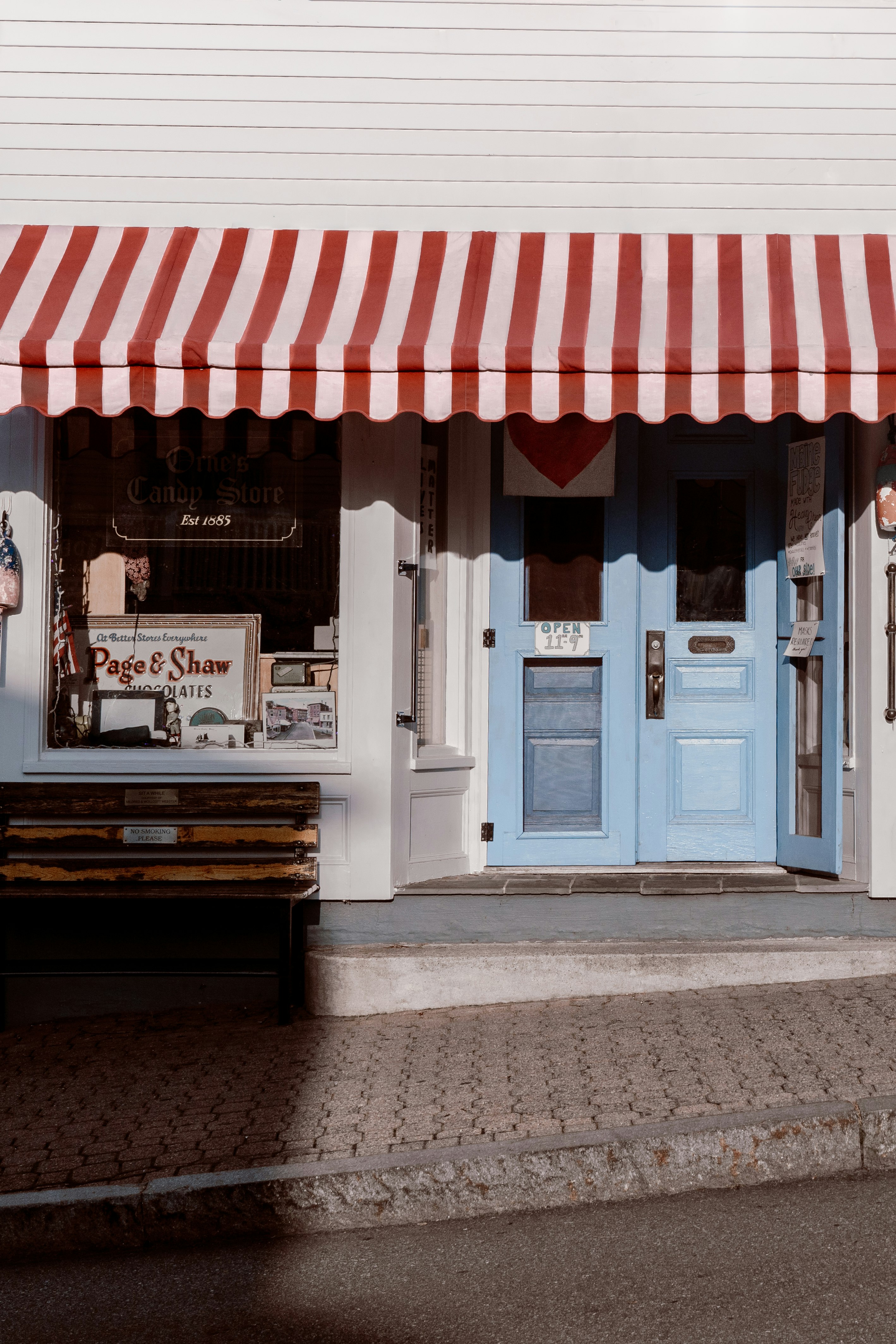 white and red store front during daytime