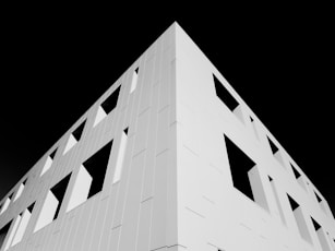 white concrete building with black background