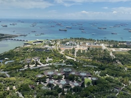 Lush greenery and modern architecture blending seamlessly in Singapore's Gardens by the Bay.
