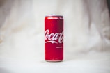 coca cola can on white table